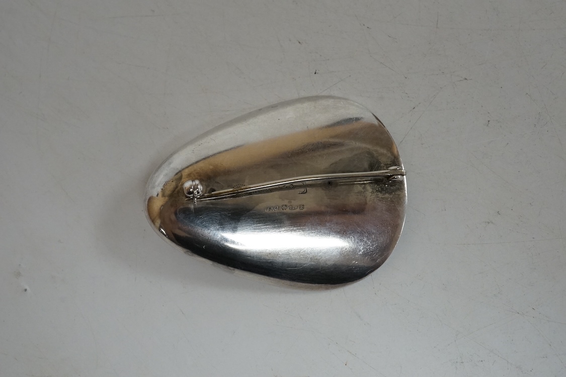 An Elizabeth II Nanna & Jorgen Ditzel for Georg Jensen silver brooch, design number 328, import marks for Georg Jensen Ltd, London, 1965, 51mm, with Jensen box.